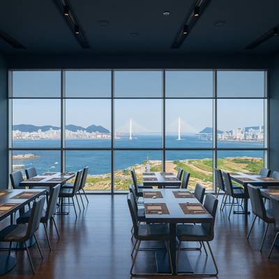 Restaurant with ocean view inside busan Asti Hotel Busan Station overlooking the coastal bridge

