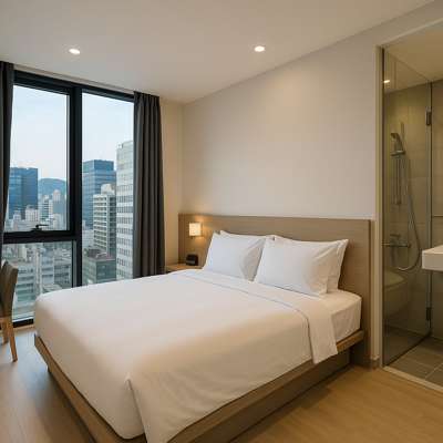 Modern hotel room at Seoul hotel New Blanc Central Myeongdong with city view and minimalist interior