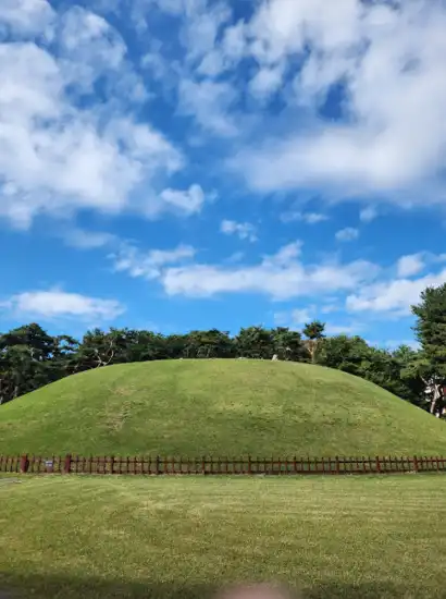 Seonjeongneung royal tomb under a bright blue sky, part of the Gangnam travel course in Seoul.
