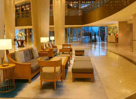 Grand Walkerhill Seoul lobby with natural warm lighting and seating area