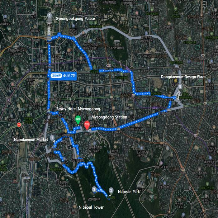 Map showing walking route from Savoy Hotel Myeongdong to Dongdaemun Design Plaza in central Seoul, passing Namsan Park and Namdaemun Market