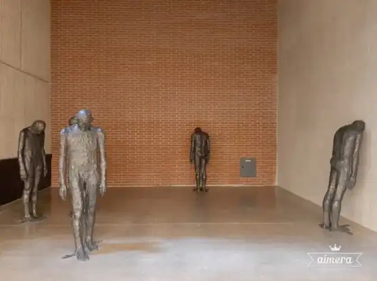 Modern bronze human-form sculptures displayed inside Seosomun Shrine History Museum in Seoul