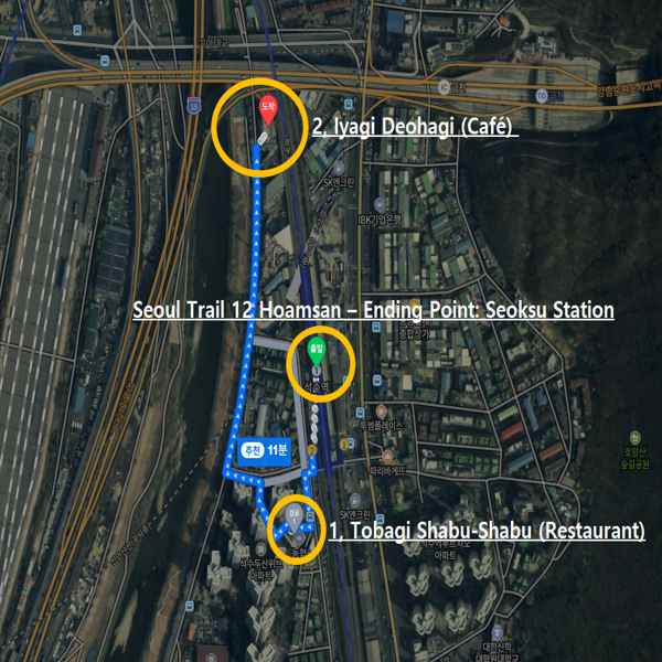 Map showing the ending point of Seoul Trail 12 Hoamsan at Seoksu Station with nearby spots Tobagi Shabu-Shabu and Iyagi Deohagi Café highlighted.