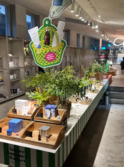 Interior display of Amore Seongsu featuring curated beauty products and greenery, related to the Amore Seongsu K-Beauty Makeup Class.