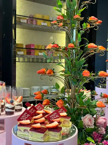 ddp cafe and tea strawberry dessert display with cakes and fresh strawberries at a Dongdaemun lounge