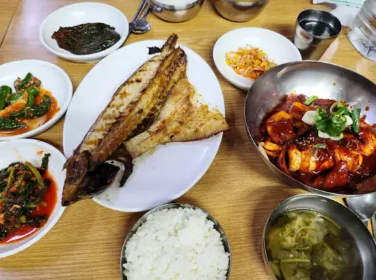 Korean grilled fish set meal with spicy squid near Dongdaemun Design Plaza, a local-style pick for dongdaemun design plaza food