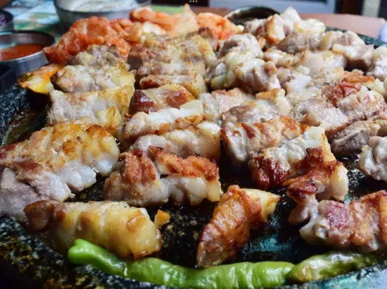 Grilled samgyeopsal Korean BBQ near Dongdaemun Design Plaza, a popular pick for dongdaemun design plaza food