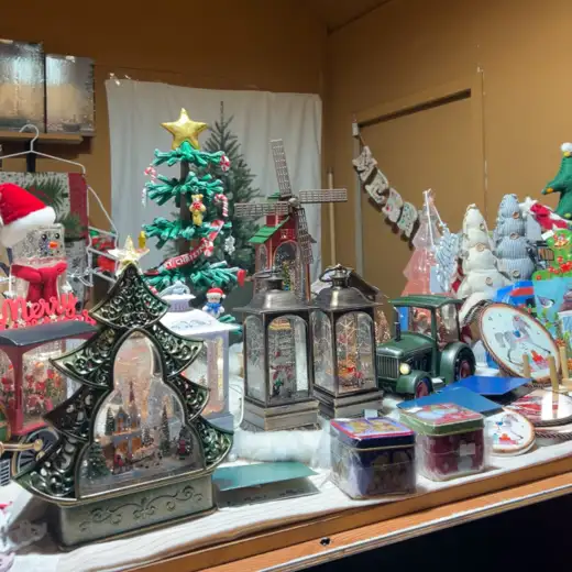 Christmas-themed gift items displayed at Gwanghwamun Market, including lantern ornaments, tree decorations, and holiday accessories.