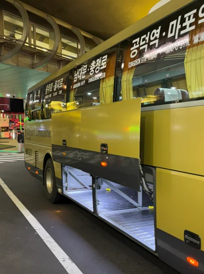Incheon Airport to Myeongdong Airport Bus 6015 with the under-bus luggage hold open for large suitcases at Incheon Airport