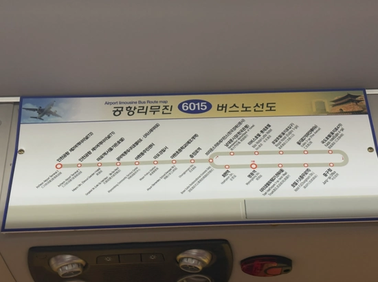 Incheon Airport to Myeongdong Airport Bus 6015 route map shown inside the bus, listing major stops including Mapo, Gongdeok, and Namdaemun