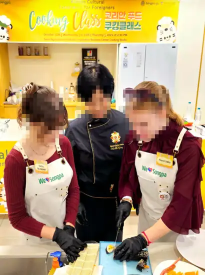 Hands-on K-Food Cooking Class Seoul with foreign participants at a Seoul Hallyu cooking experience