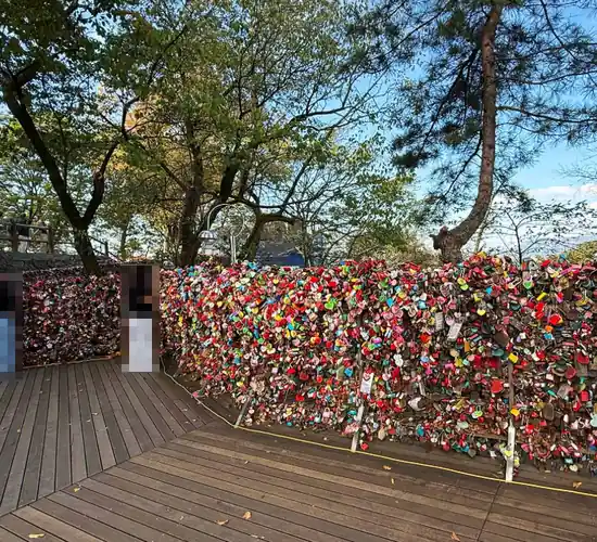 Love locks fence at N Seoul Tower on Namsan, popular photo spot for visitors planning n seoul tower tickets