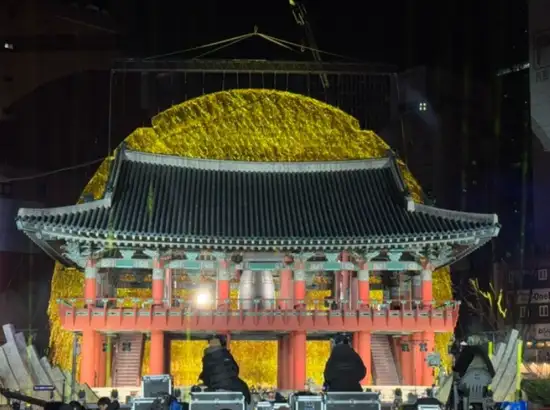 New Year Bell-Ringing Ceremony at Boshingak Pavilion in central Seoul, with stage lighting and night festival atmosphere