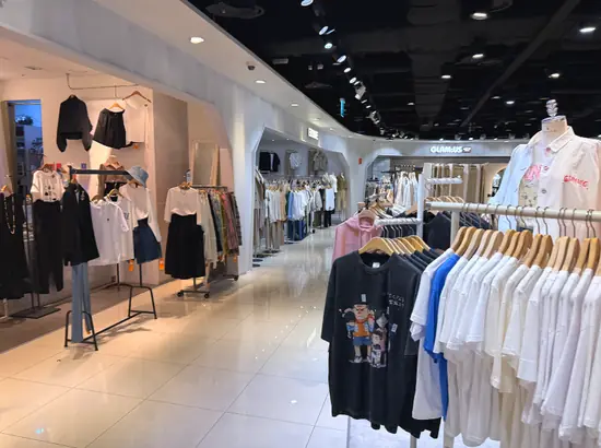 Fashion store interior in Dongdaemun, Seoul with clothing racks—helpful for planning Dongdaemun shopping hours.