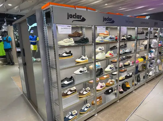 Sneaker display wall inside a Dongdaemun shopping mall in Seoul—useful for planning Dongdaemun shopping hours.