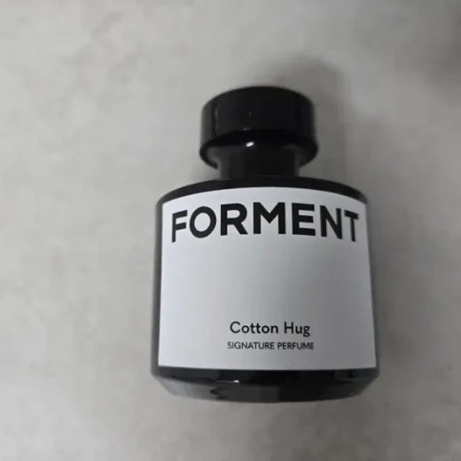 FORMENT Cotton Hug Signature Perfume bottle on a light background