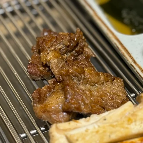Seasoned galbi grilled until caramelized, served with mushrooms at Hobo Sikdang (Sinsa direct branch)
