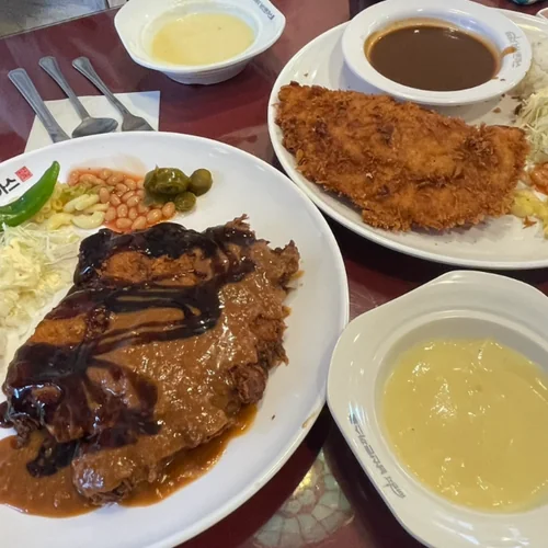 Myeongdong restaurant for groups serving donkatsu with brown sauce and side dishes