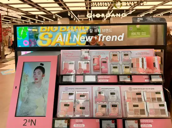 Beauty trend display inside OLIVE YOUNG Myeongdong Station Branch, featured in a myeongdong shopping street map route for tourists.