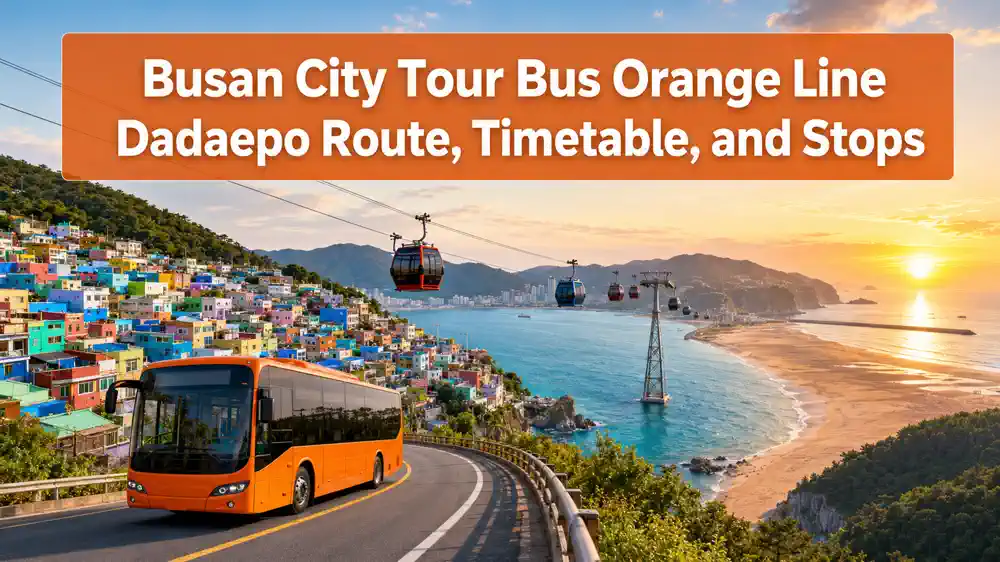 Busan City Tour Bus Orange Line traveling past Gamcheon Village toward Dadaepo Beach